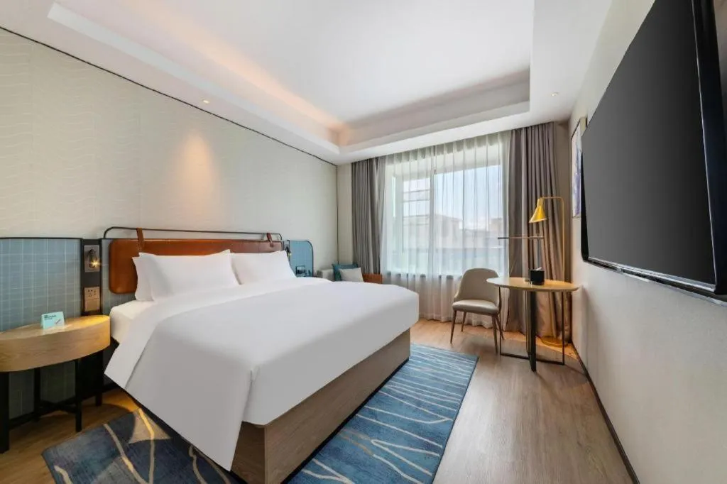 Bed in Echarm Hotel Guangzhou South Railway Station