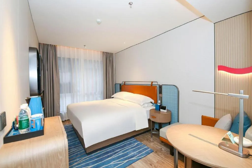 Bed in Echarm Hotel Guangzhou South Railway Station