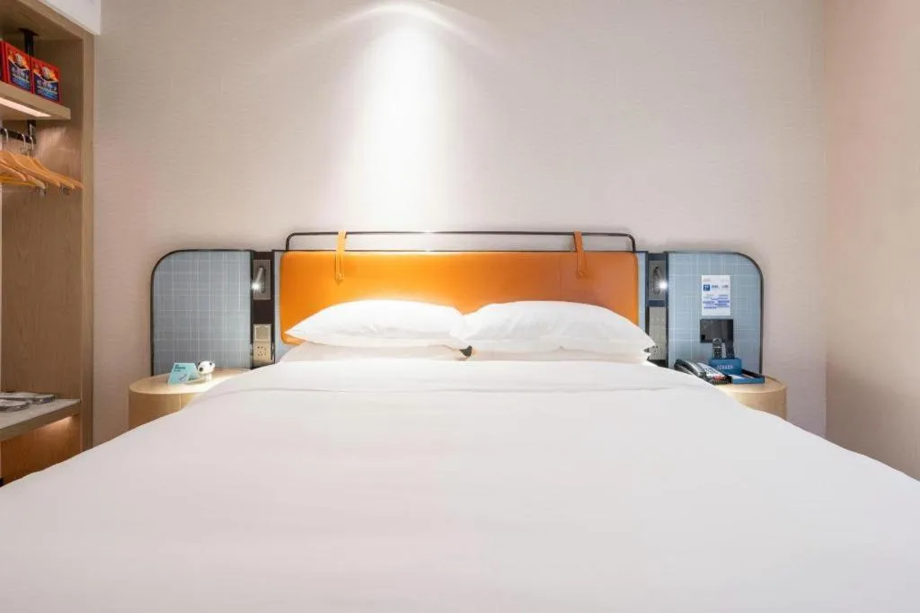 Bed in Echarm Hotel Guangzhou South Railway Station