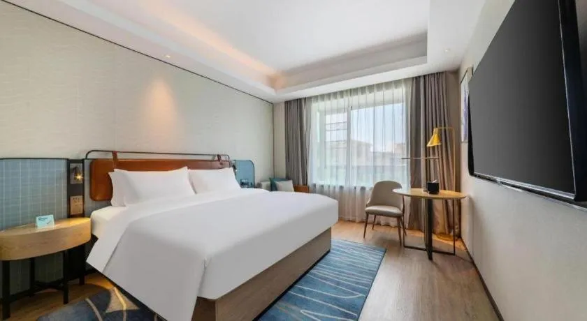 Bed in Echarm Hotel Guangzhou South Railway Station