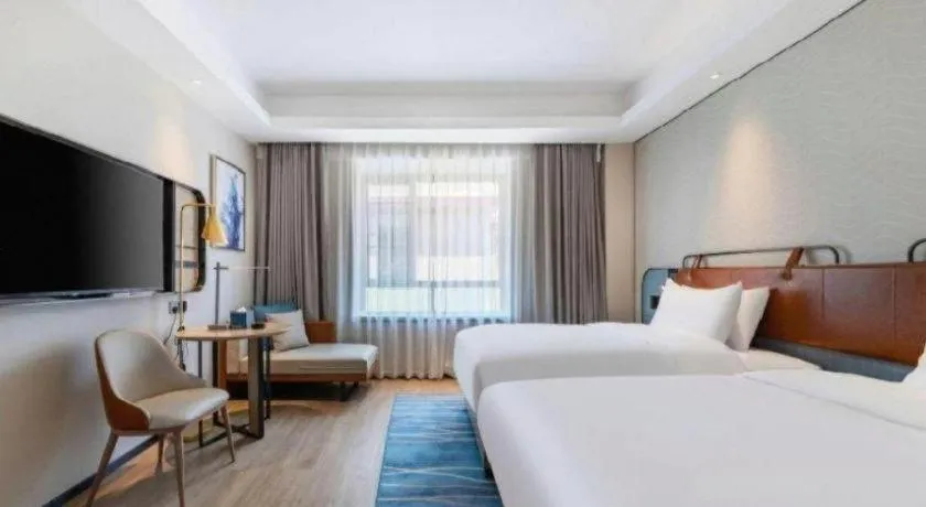 Bed in Echarm Hotel Guangzhou South Railway Station