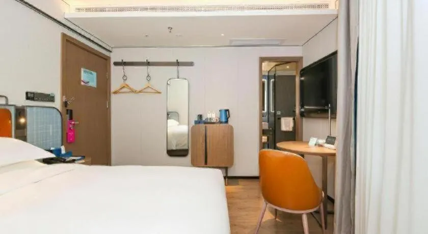 Bed in Echarm Hotel Guangzhou South Railway Station