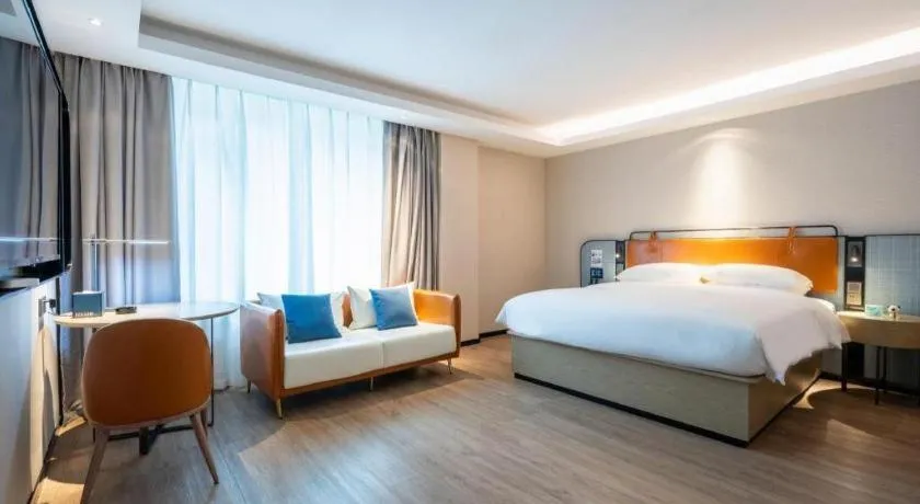 Bed in Echarm Hotel Guangzhou South Railway Station