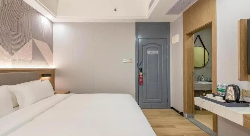 Bed in Borrman Hotel Zhanjiang Jinshawan Chikan Republic of China Style Street