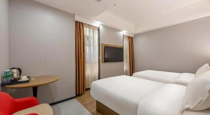 Bed in Borrman Hotel Zhanjiang Jinshawan Chikan Republic of China Style Street