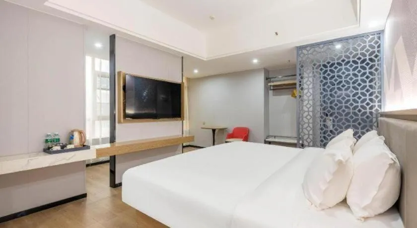 Bed in Borrman Hotel Zhanjiang Jinshawan Chikan Republic of China Style Street