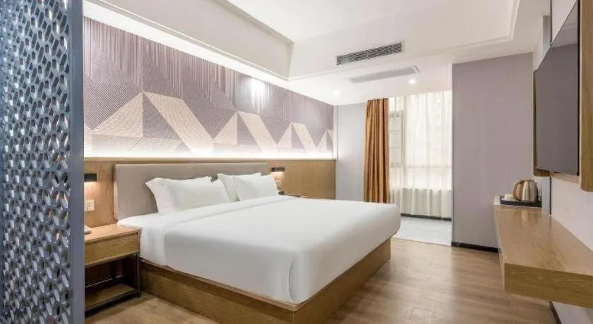 Bed in Borrman Hotel Zhanjiang Jinshawan Chikan Republic of China Style Street