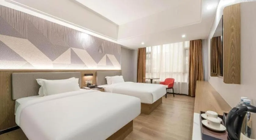 Bed in Borrman Hotel Zhanjiang Jinshawan Chikan Republic of China Style Street