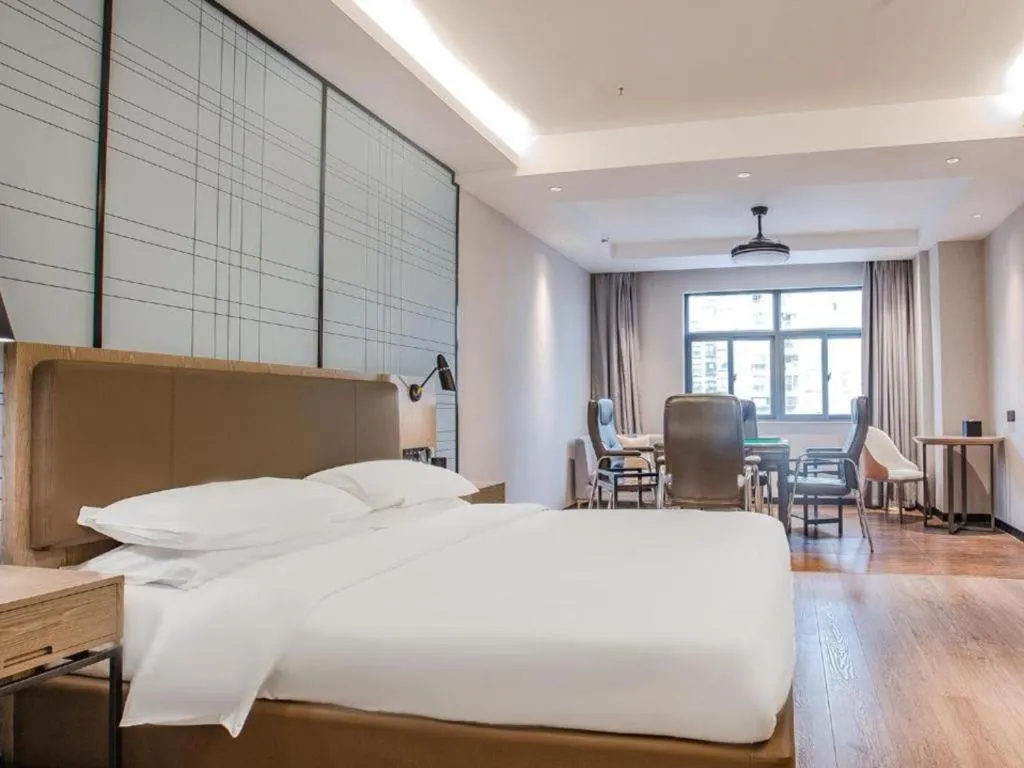 Bed in Echarm Hotel Changsha Yueliangdao Guanziling Metro Station