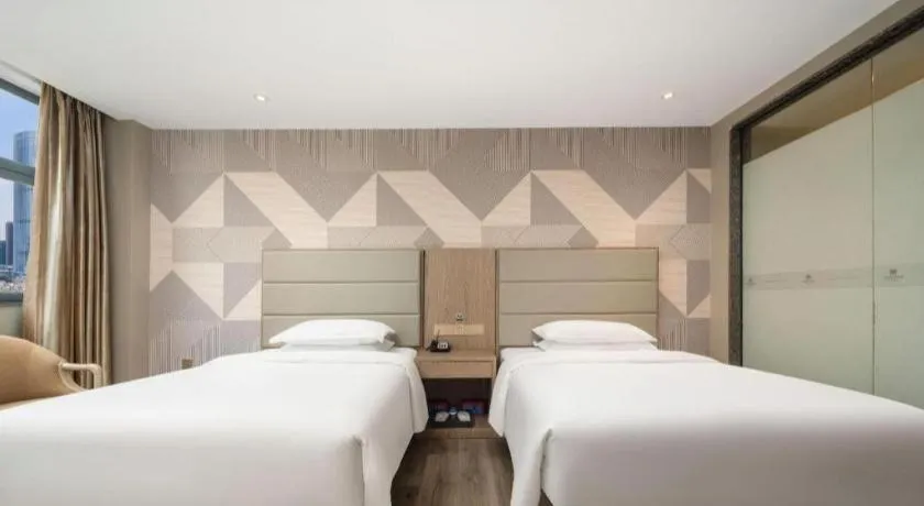 Bed in Borrman Hotel Zhongshan Lihe Plaza