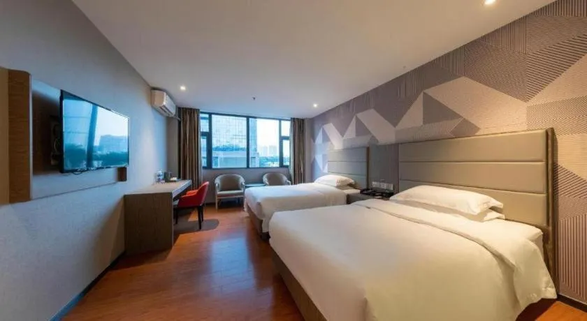 Bed in Borrman Hotel Zhongshan Lihe Plaza