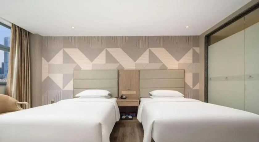 Bed in Borrman Hotel Zhongshan Lihe Plaza