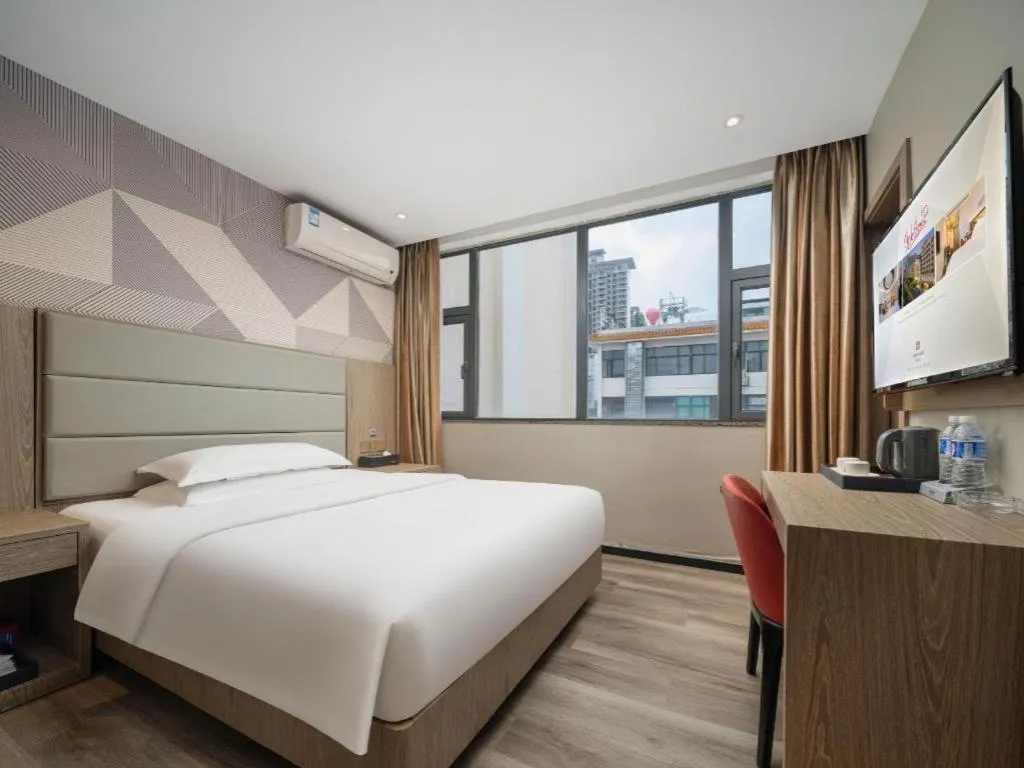 Bed in Borrman Hotel Zhongshan Lihe Plaza