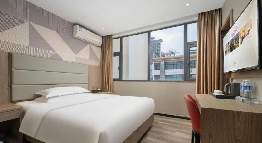 Bed in Borrman Hotel Zhongshan Lihe Plaza