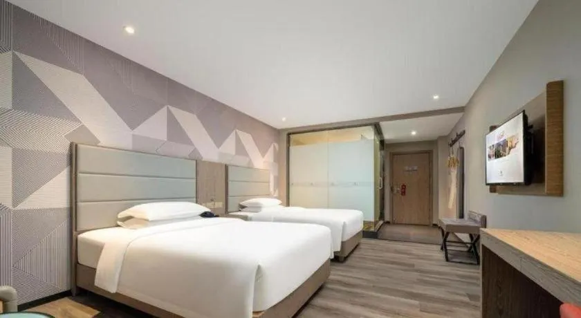 Bed in Borrman Hotel Zhongshan Lihe Plaza