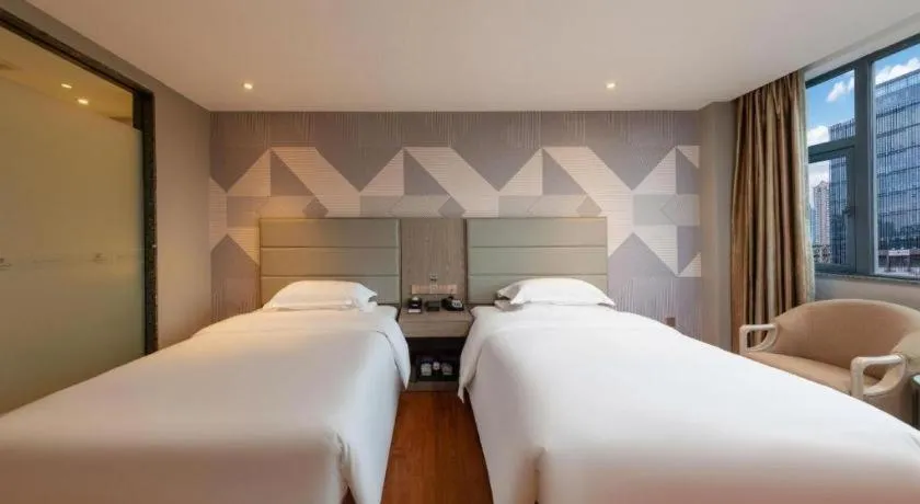 Bed in Borrman Hotel Zhongshan Lihe Plaza