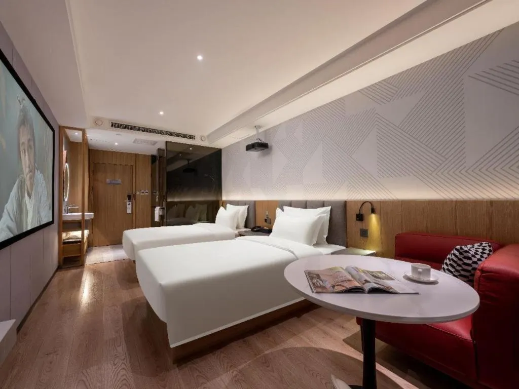 Bed in Borrman Hotel Beijing Guomao Jinsong Metro Station