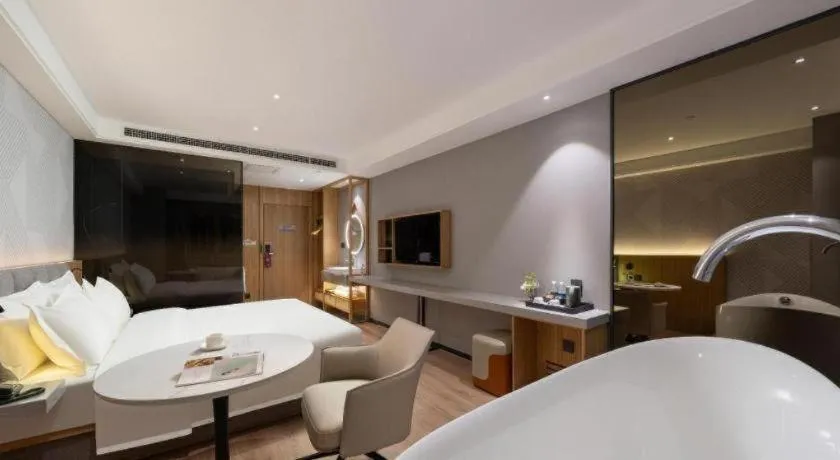 Bed in Borrman Hotel Beijing Guomao Jinsong Metro Station