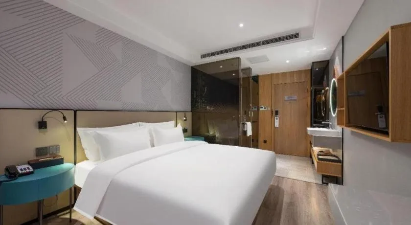 Bed in Borrman Hotel Beijing Guomao Jinsong Metro Station