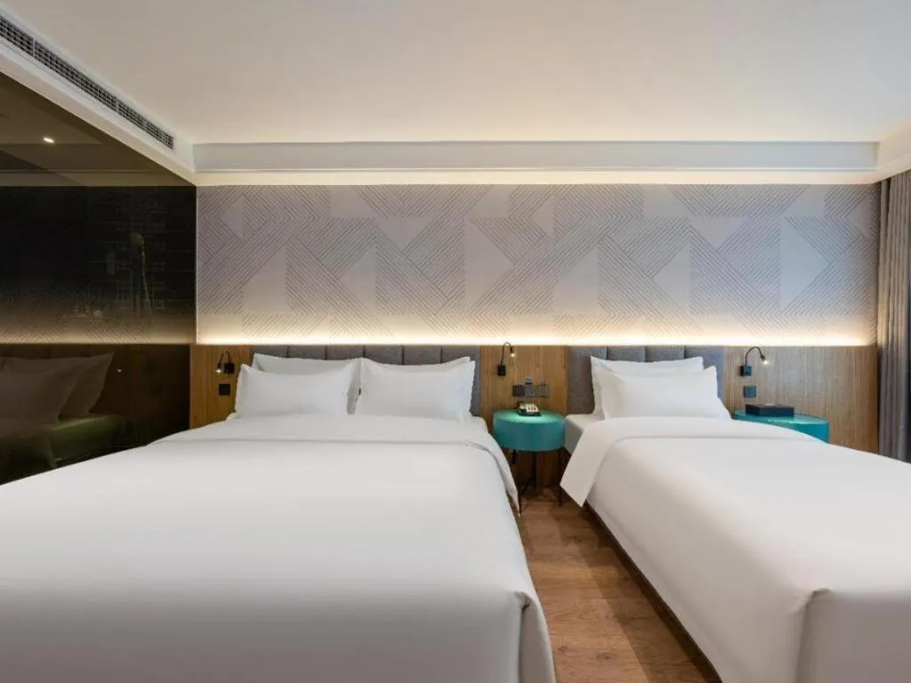 Bed in Borrman Hotel Beijing Guomao Jinsong Metro Station