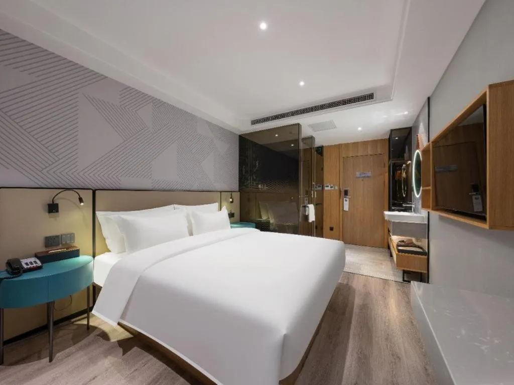 Bed in Borrman Hotel Beijing Guomao Jinsong Metro Station