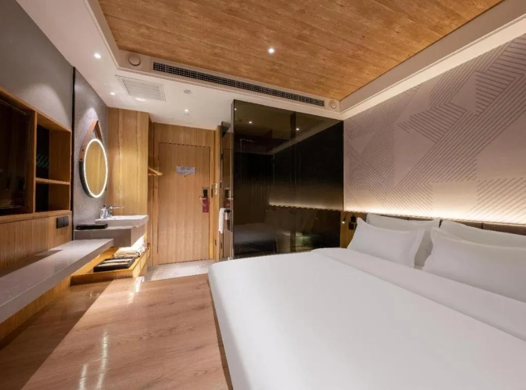 Bed in Borrman Hotel Beijing Guomao Jinsong Metro Station