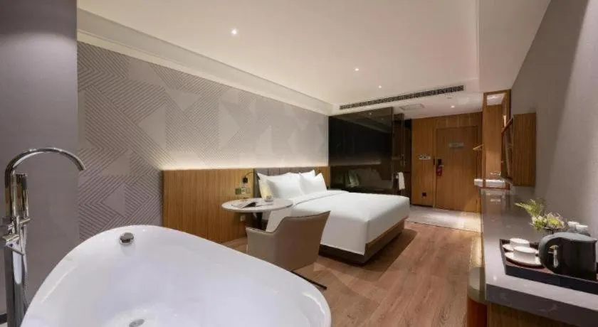 Bed in Borrman Hotel Beijing Guomao Jinsong Metro Station