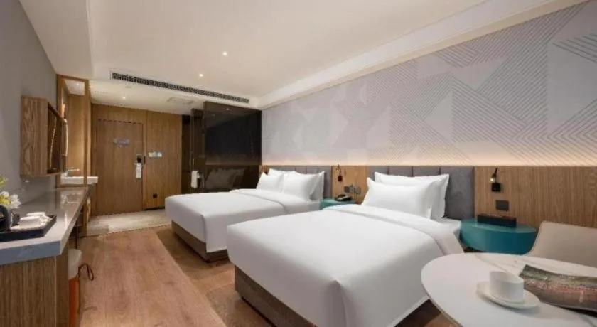 Bed in Borrman Hotel Beijing Guomao Jinsong Metro Station