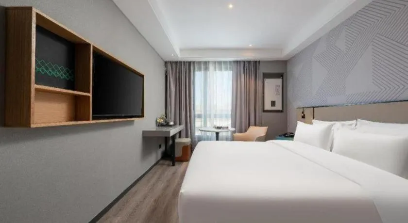 Bed in Borrman Hotel Beijing Guomao Jinsong Metro Station