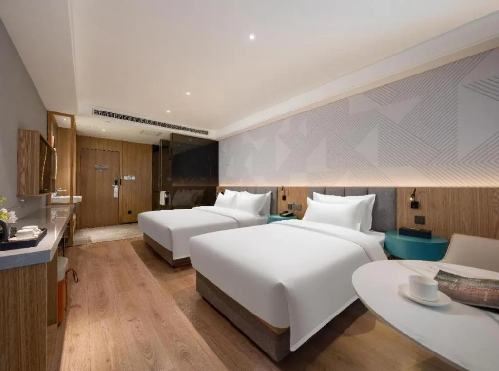 Bed in Borrman Hotel Beijing Guomao Jinsong Metro Station