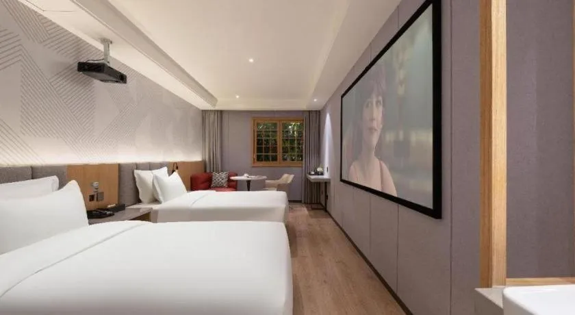 Bed in Borrman Hotel Beijing Guomao Jinsong Metro Station