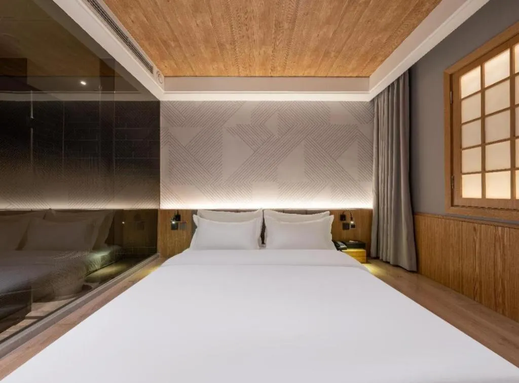 Bed in Borrman Hotel Beijing Guomao Jinsong Metro Station