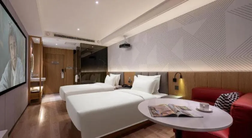 Bed in Borrman Hotel Beijing Guomao Jinsong Metro Station