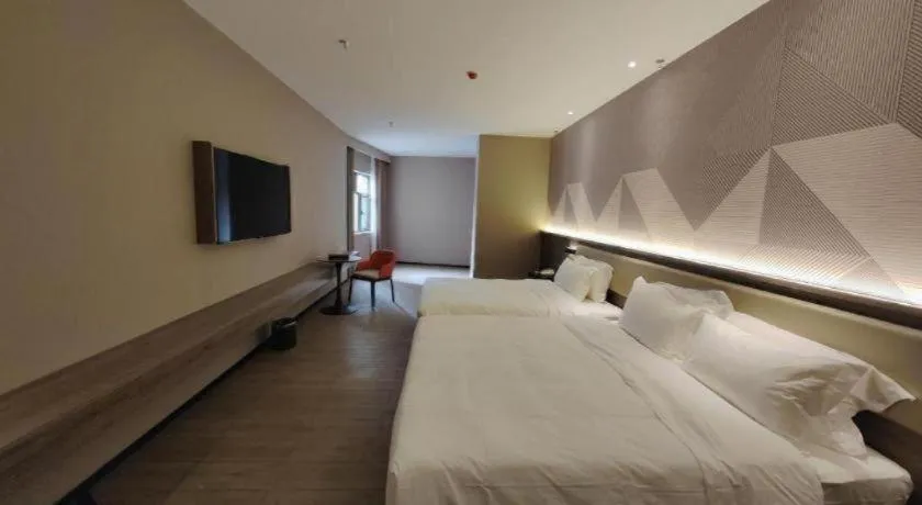 Bed in Borrman Hotel Korla Peacock River