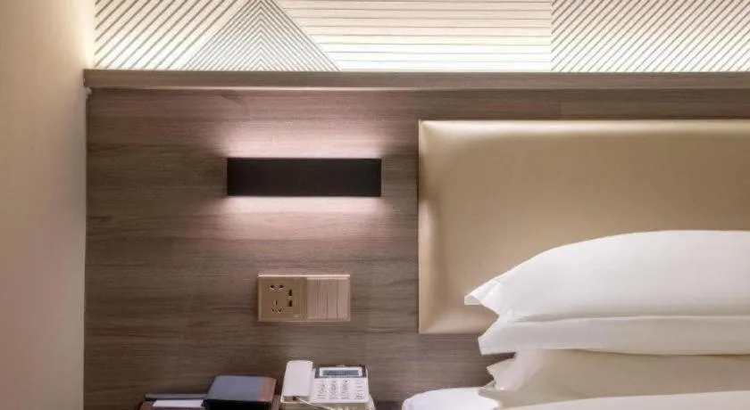 Bed in Borrman Hotel Korla Peacock River