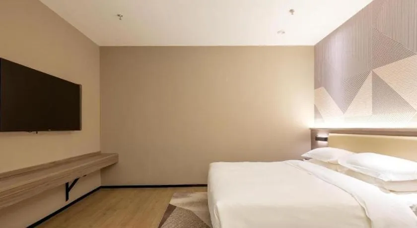 Bed in Borrman Hotel Korla Peacock River