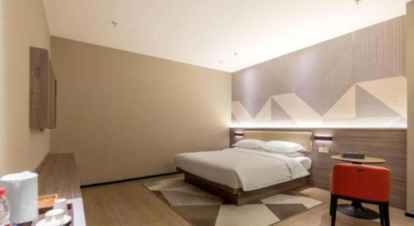 Bed in Borrman Hotel Korla Peacock River