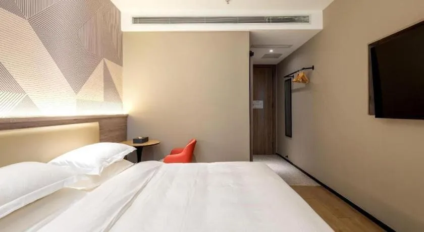 Bed in Borrman Hotel Korla Peacock River