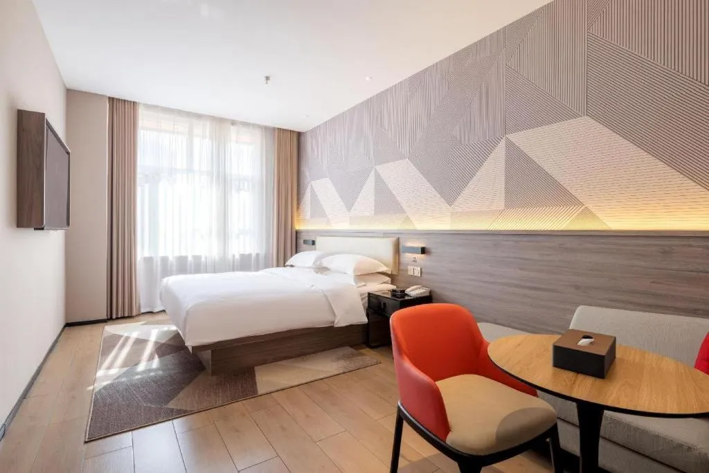 Bed in Borrman Hotel Korla Peacock River