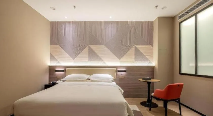 Bed in Borrman Hotel Korla Peacock River