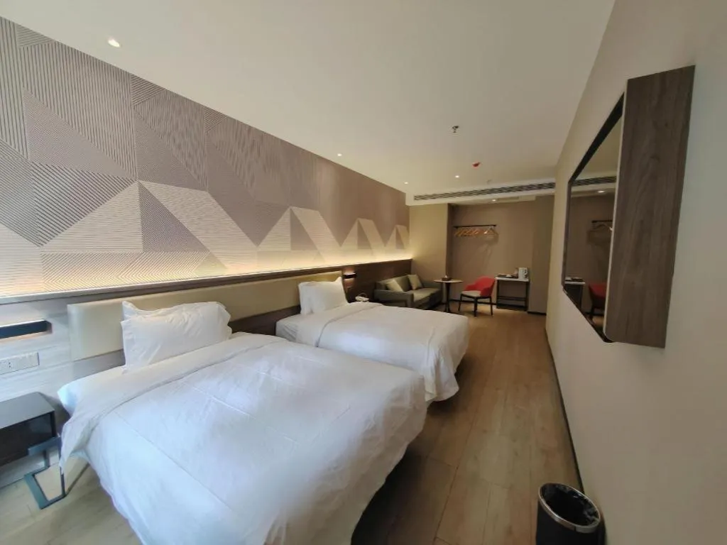 Bed in Borrman Hotel Korla Peacock River