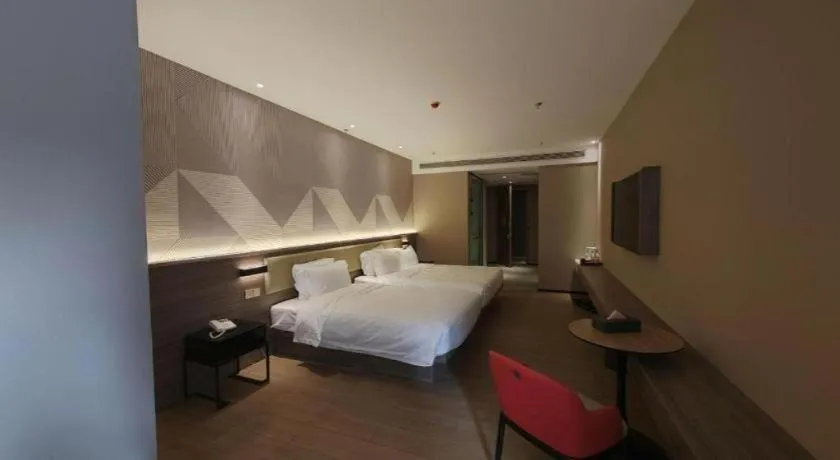 Bed in Borrman Hotel Korla Peacock River