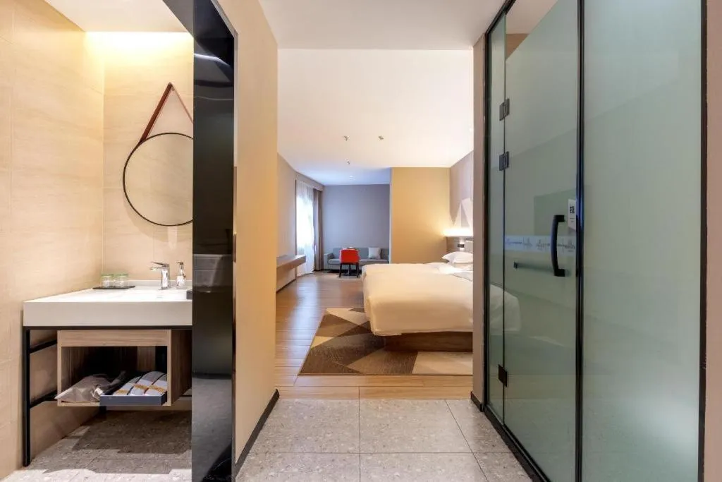 Bed in Borrman Hotel Korla Peacock River