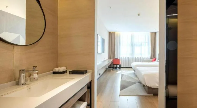 Bed in Borrman Hotel Korla Peacock River