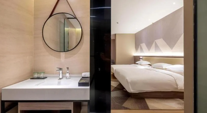 Bed in Borrman Hotel Korla Peacock River