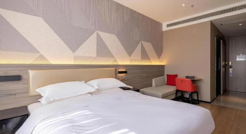 Bed in Borrman Hotel Korla Peacock River