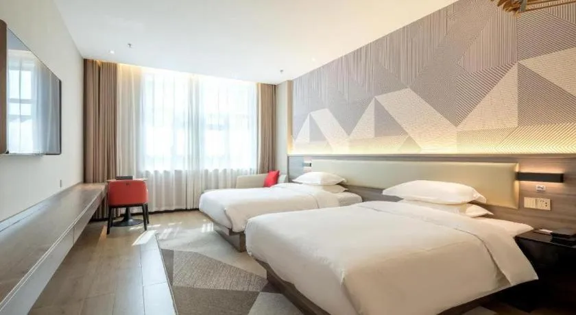 Bed in Borrman Hotel Korla Peacock River