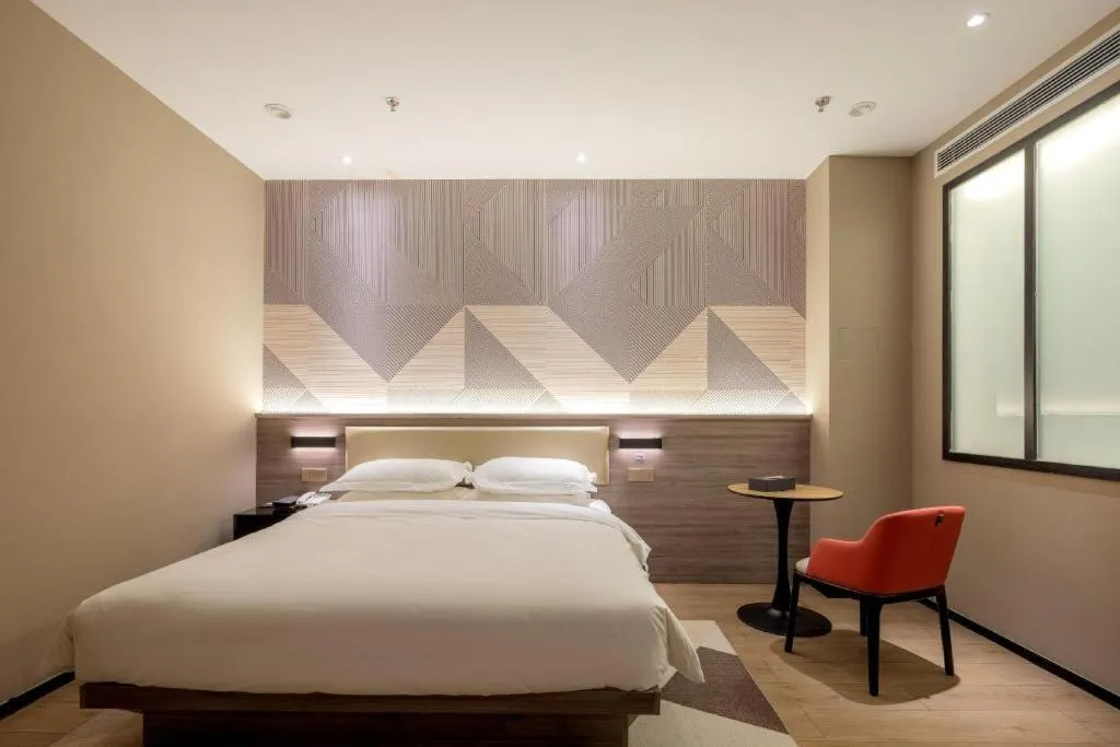 Bed in Borrman Hotel Korla Peacock River