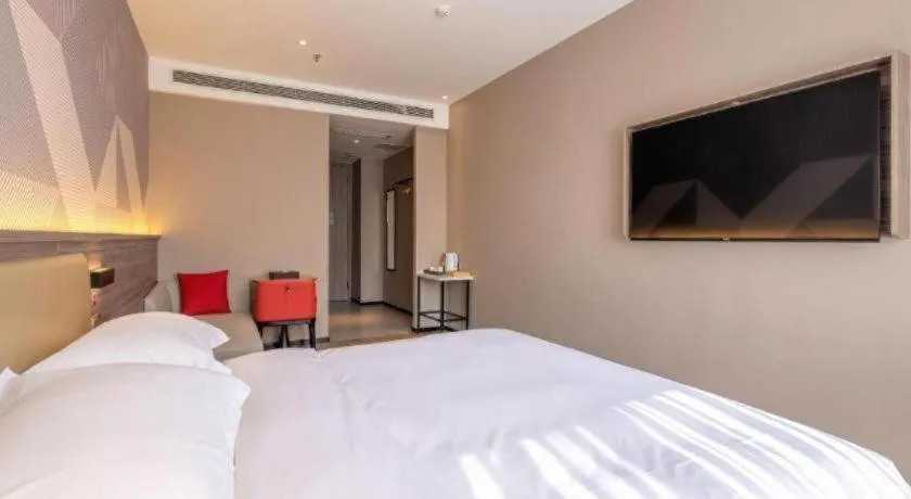 Bed in Borrman Hotel Korla Peacock River