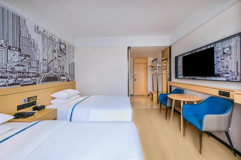 Bed in City Comfort Inn Huize Ancient City